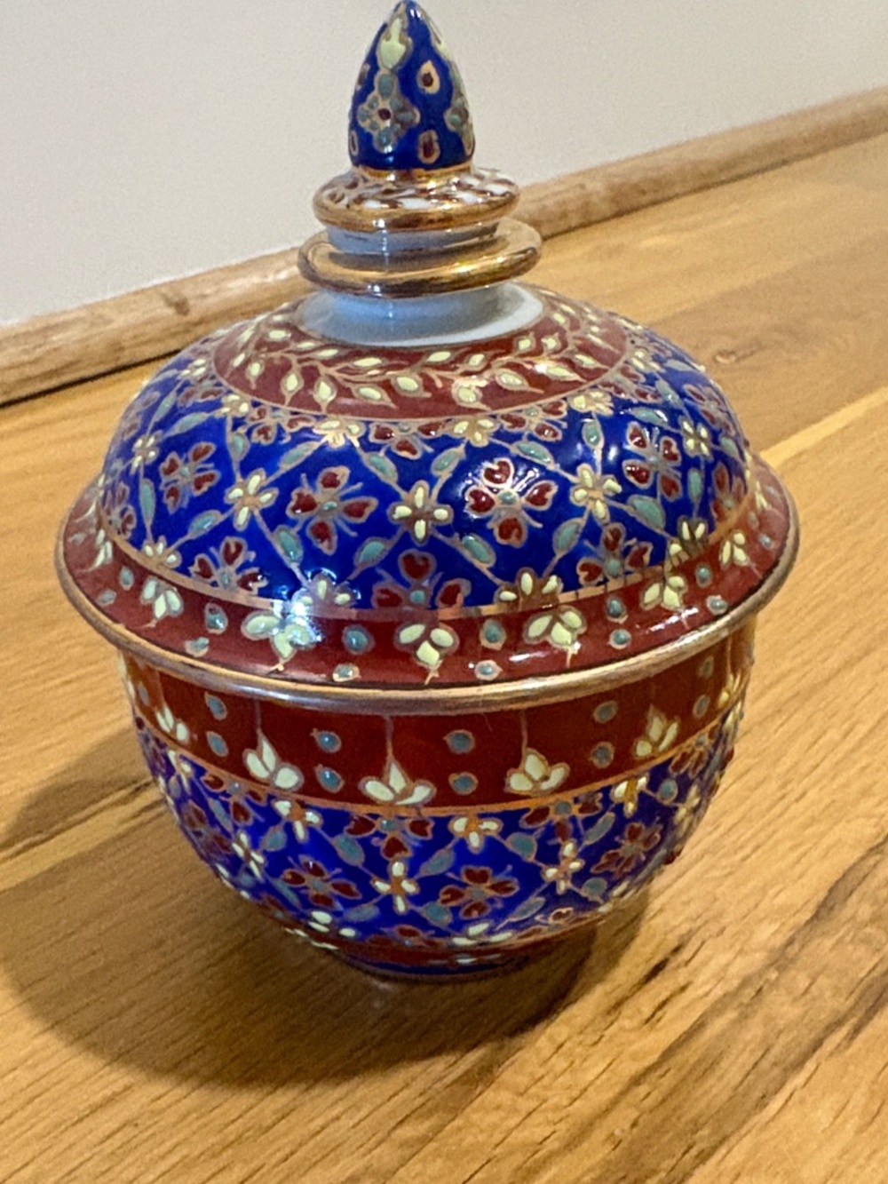 Thai Benjarong porcelain jar with a lid